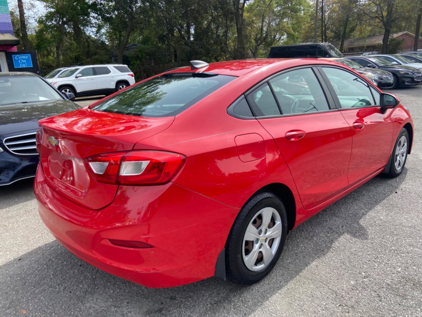 2016 RED CHEVROLET CRUZE LS AUTO (1G1BC5SM7G7) with an 1.4L engine, Automatic transmission, located at 5103 Dorchester Rd., Charleston, SC, 29418-5607, (843) 767-1122, 36.245171, -115.228050 - Photo#6